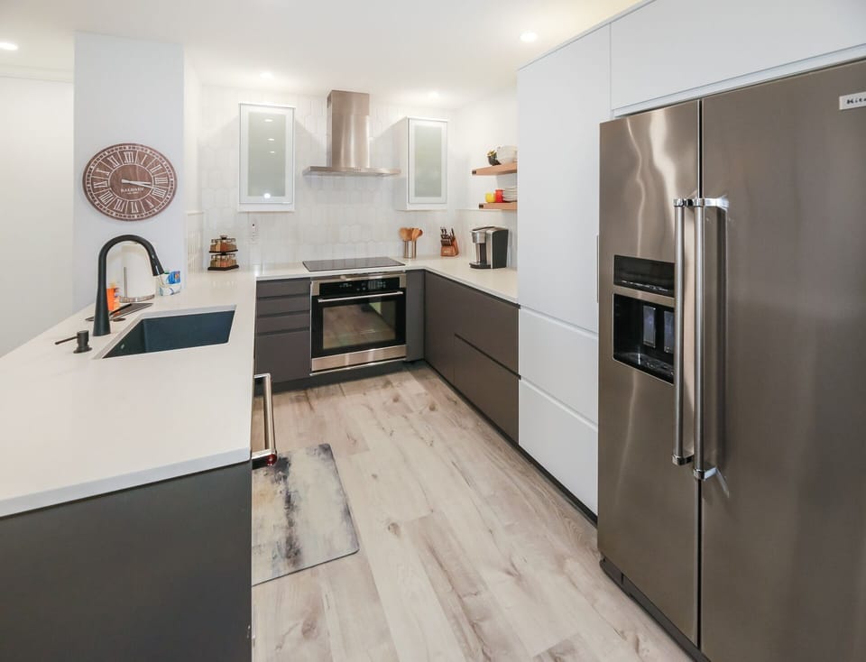 Modern culinary haven with sleek design and ample counter space.