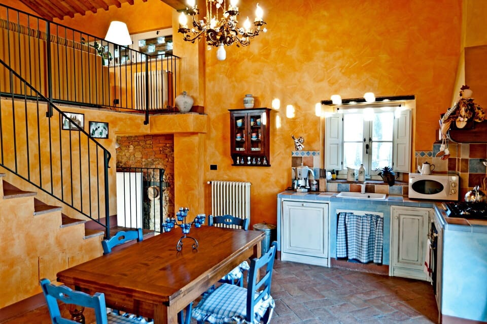 Table, Furniture, Property, Cabinetry, Wood, Interior Design, Lighting, Architecture, Orange, Building