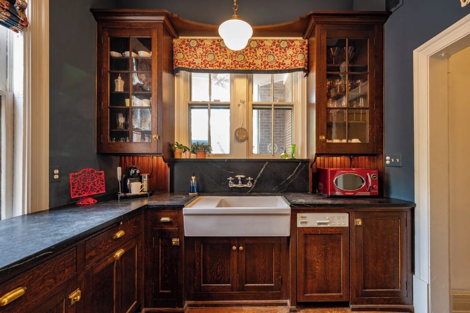Fully equipped chef's kitchen featuring premium amenities and a microwave