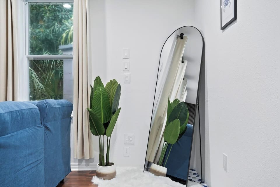 Full-length mirror for getting ready before a night out, beach day, or family photos.