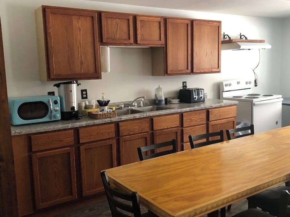 Common area kitchen shared among guests.