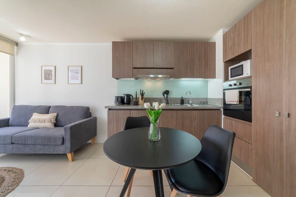 Cozy kitchen and living area with modern amenities and a bright, inviting atmosphere perfect for relaxing or entertaining.