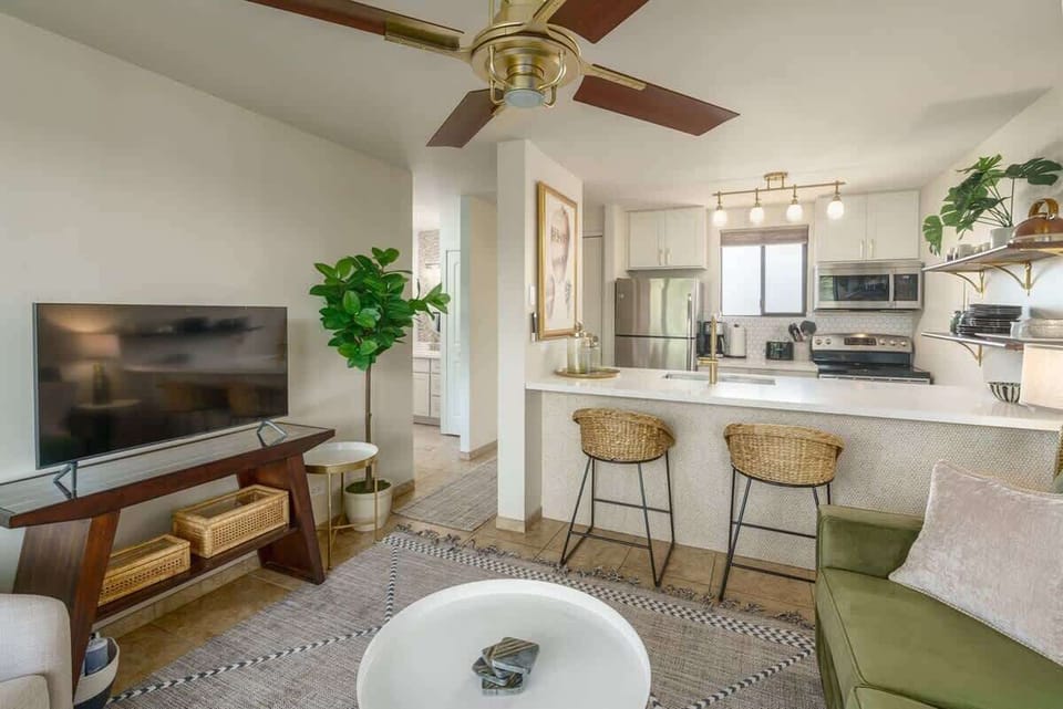 Designer touches throughout! Relax in style with our inviting living area & full kitchen.