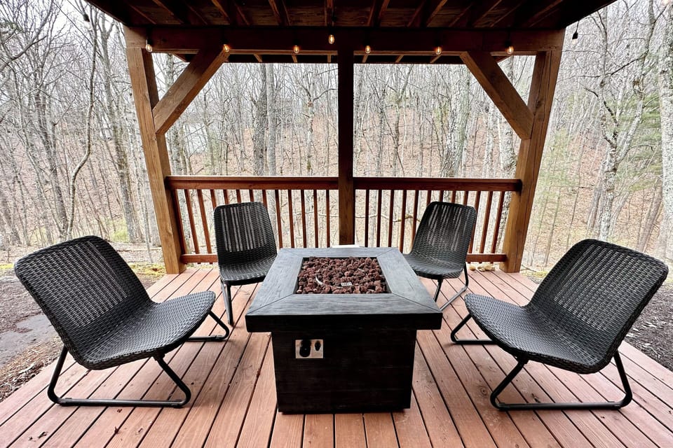 Easy to use gas fire pit located on the lower level patio