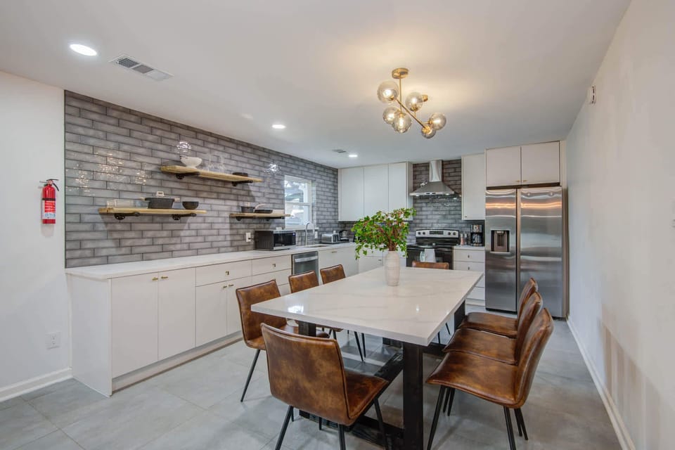 This fully equipped kitchen has everything you need to unleash your culinary genius, from upgraded kitchen appliances to a beautiful dining area!