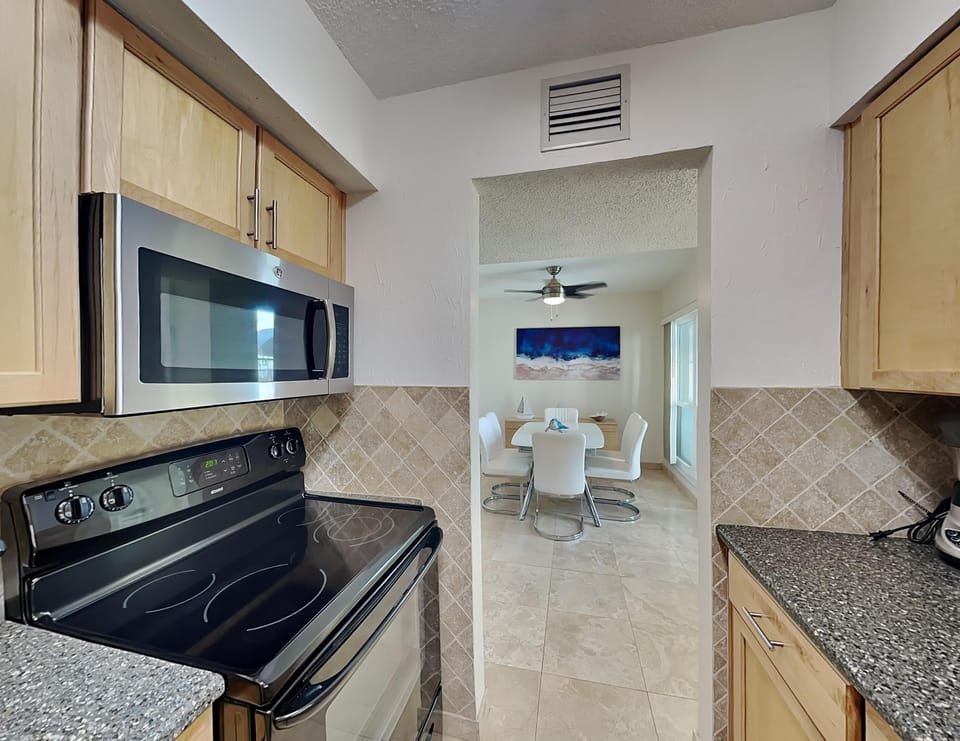 Fully Equipped Kitchen with Stainless Steel Appliances