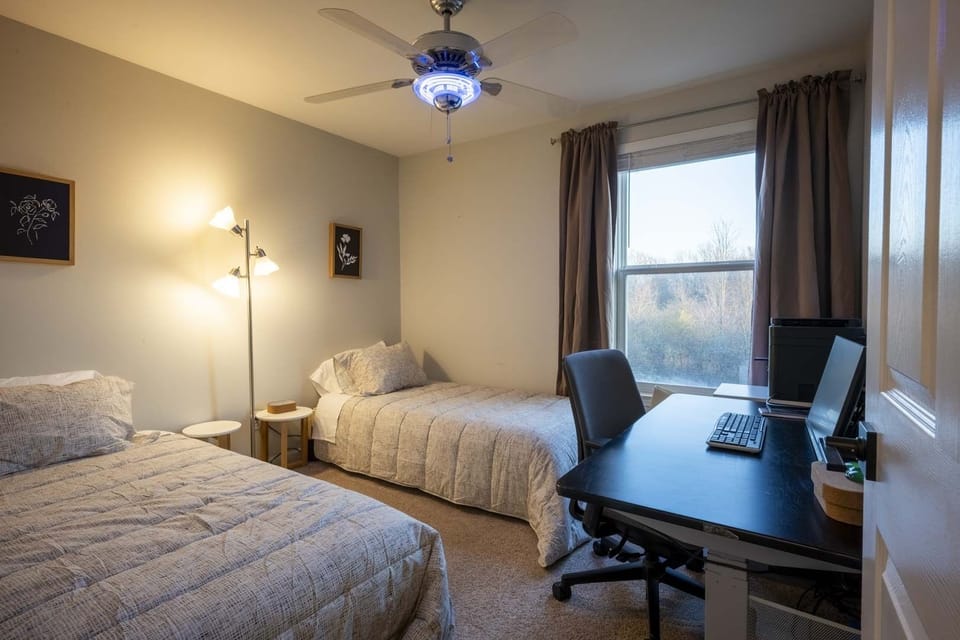 Second floor bedroom: 2 twins and a sitting/standing workstation.