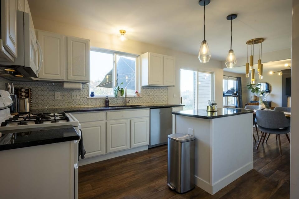 fully stocked main floor kitchen. gas stove, dishwasher
