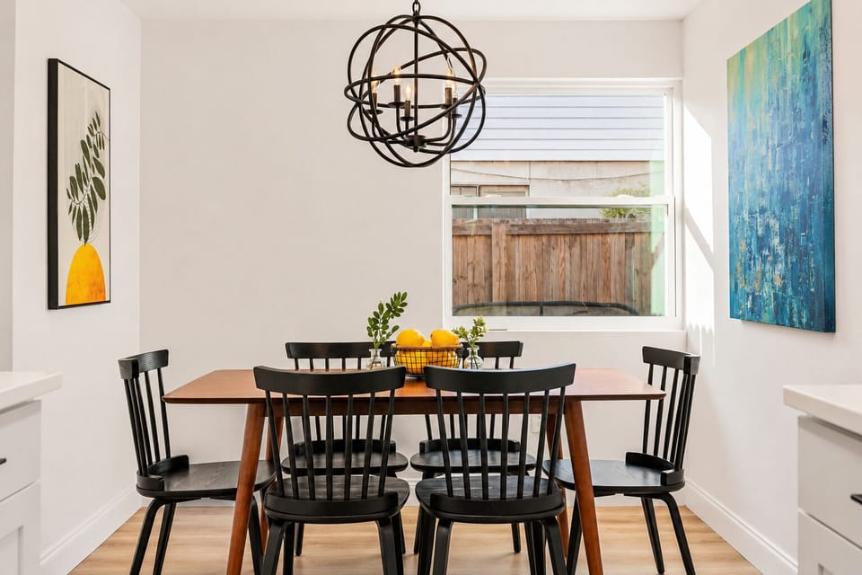 Bright dining nook with backyard views for slow morning coffees