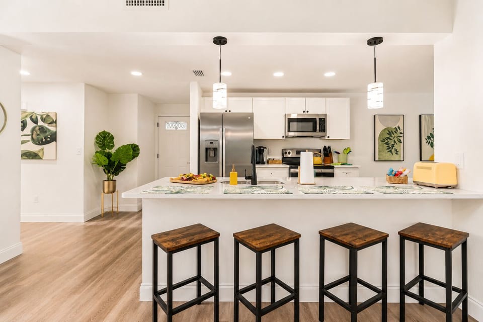 Pull up a stool at the breakfast bar for coffee before the day begins