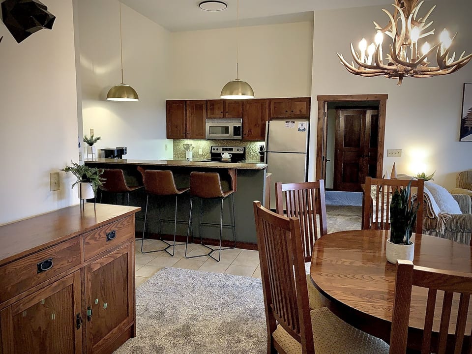 The open living space allows everyone to hang together- whether you’re working, cooking, or relaxing! 