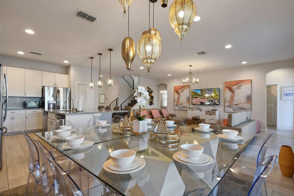 Elegant open floor plan with modern dining, kitchen, and living area