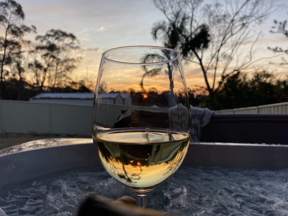 Enjoy the spectacular sunsets with your complimentary local wine