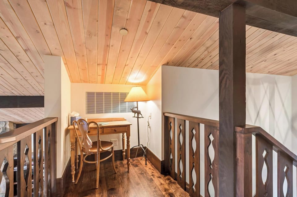 Private study outside of the master bedroom, overlooking the main living and dining area.