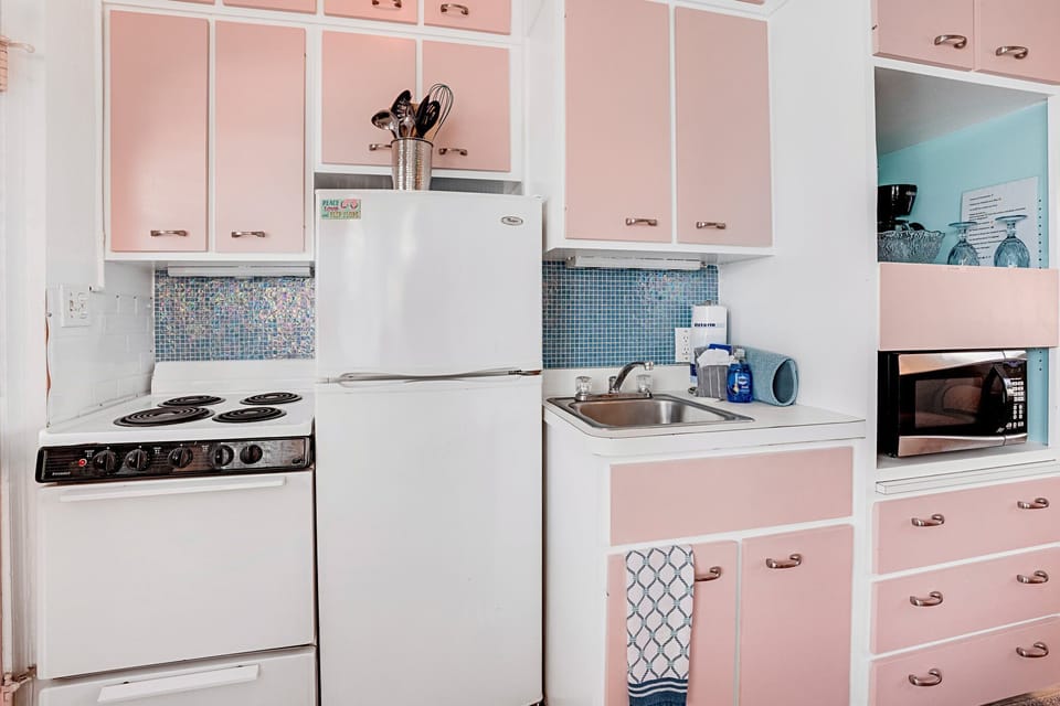 Full Kitchen amenities - fridge, stove, oven, microwave, basic cooking utensils, dishware, silverware, glasses.