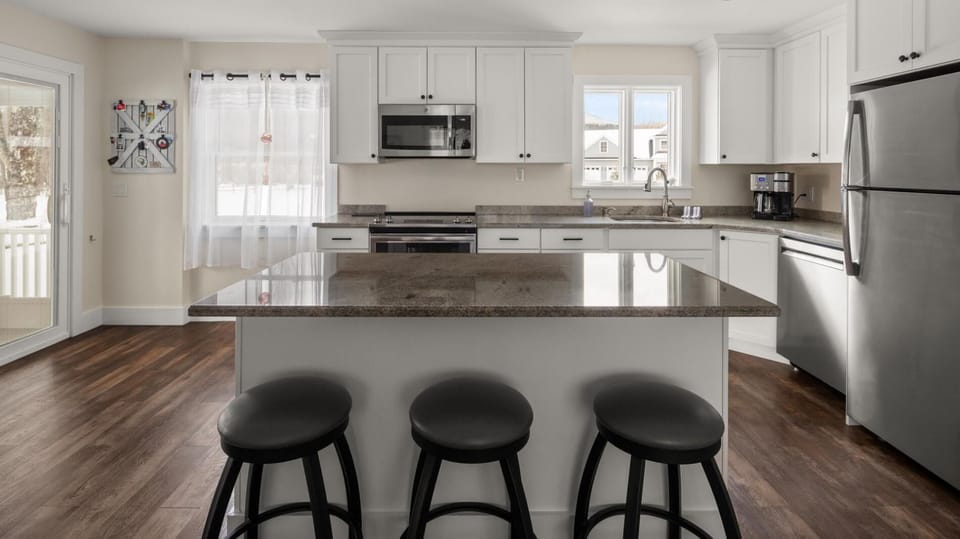 Riverbend Retreat: A Three-Story Haven in Stowe (2721)