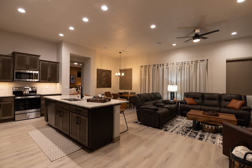 Open concept living area with quality furnishings.