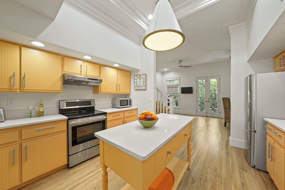UPDATED KITCHEN W/CENTER ISLAND; ALL STAINLESS STEEL APPLIANCES
