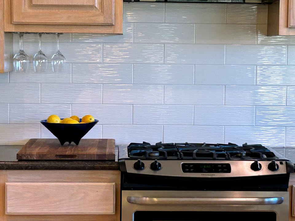 Clean and open kitchen cooking area.