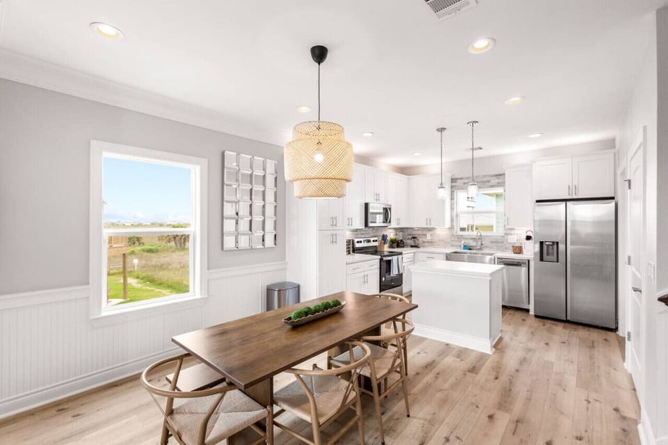 This dining area is located next to the kitchen