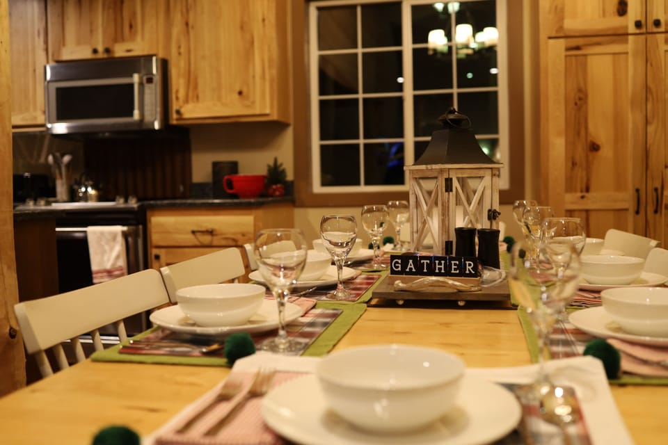 3 eating areas - bar, small table, and large table - seating for 16 total. 