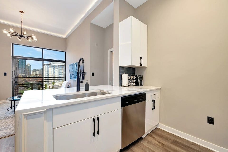 Beautiful modern gourmet kitchen with a spectacular skyline view