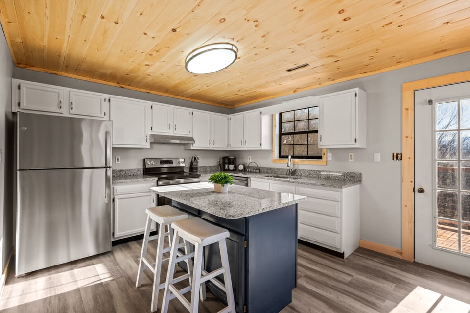 Fully stocked kitchen with new appliances. 