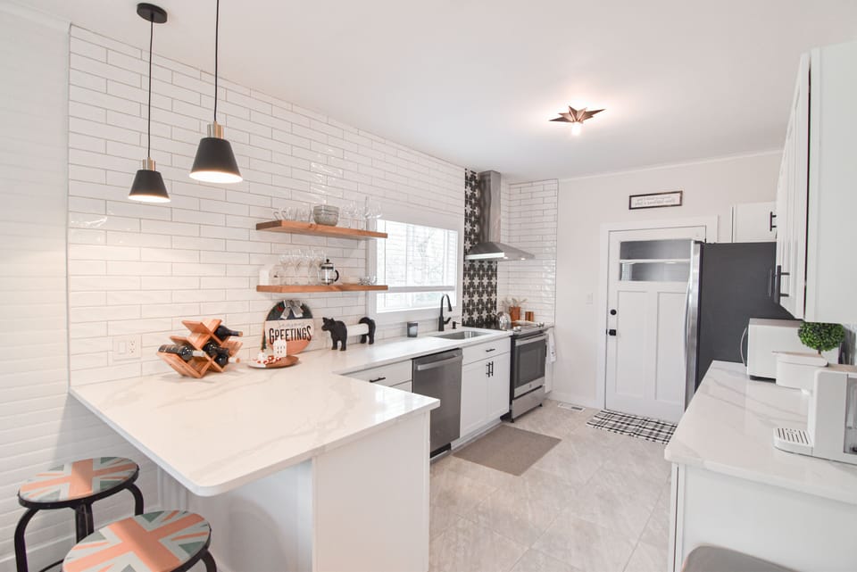 Breakfast bar with outlet makes a great space to pull out the laptop.