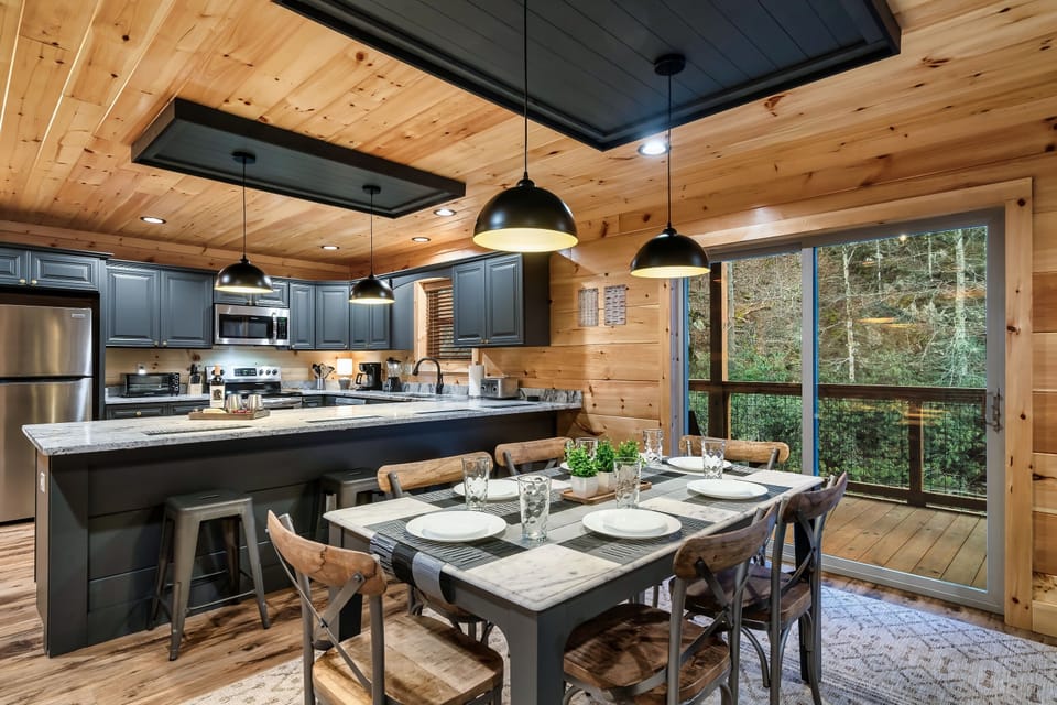 Showcasing the dining area overlooking the kitchen.