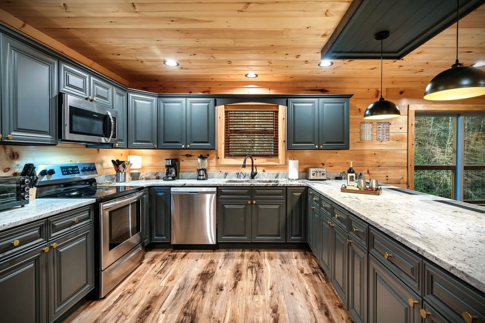 Who doesn't LOVE a spacious and organized kitchen like this? Granite countertop and ample space to cook your favorite dishes! Our kitchen is fully stocked with everything you can think of. Enjoy a family cooked-meal together.