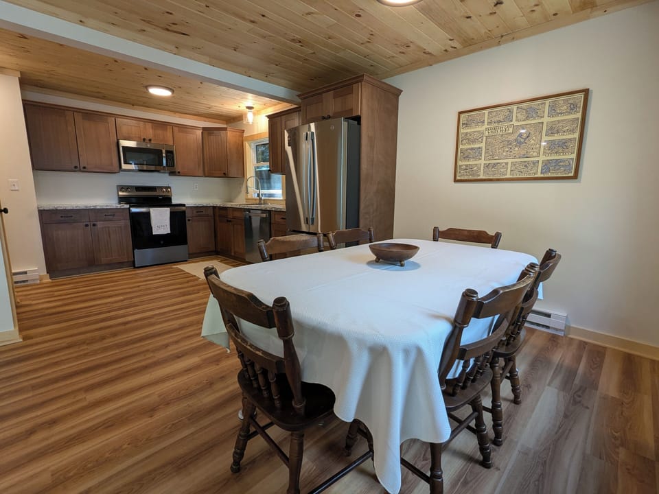 View from the kitchen table. There is a leaf to seat 8.