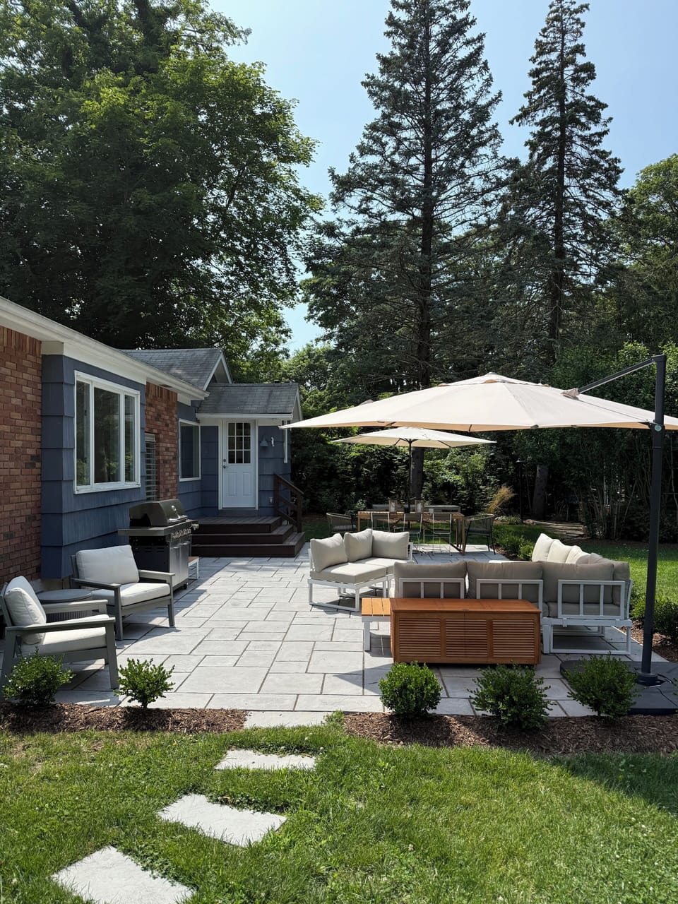 Backyard, with outdoor seating + dining table that seats eight. Fully fenced in.