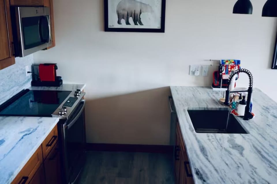 Newly-remodeled kitchen with stainless steel appliances.