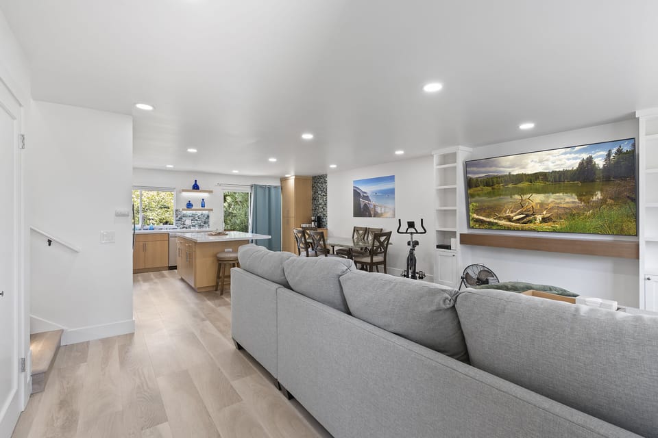 Great room with super comfy 12' sectional features 5' ottoman/coffee table