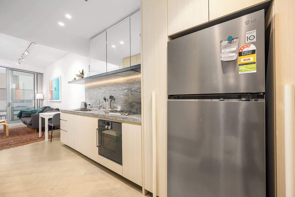 Fully equipped modern kitchen with large fridge