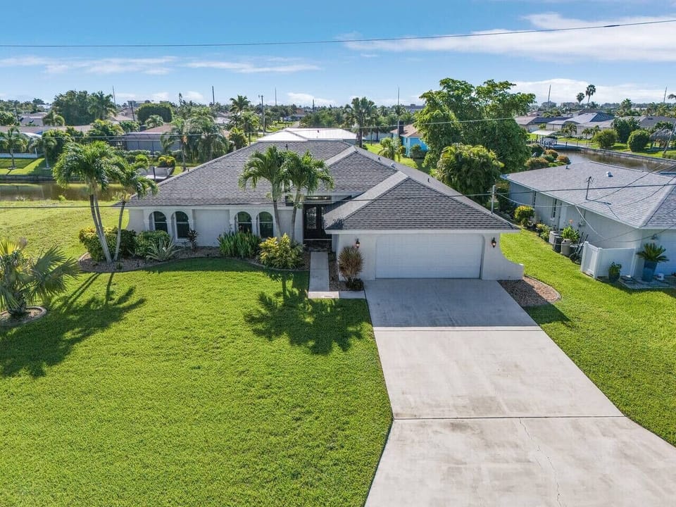 A beautifully maintained waterfront villa located in desirable SE Cape Coral.