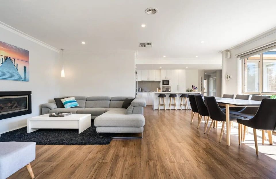 Main living and main kitchen - looking out to pool, alfresco and putting green