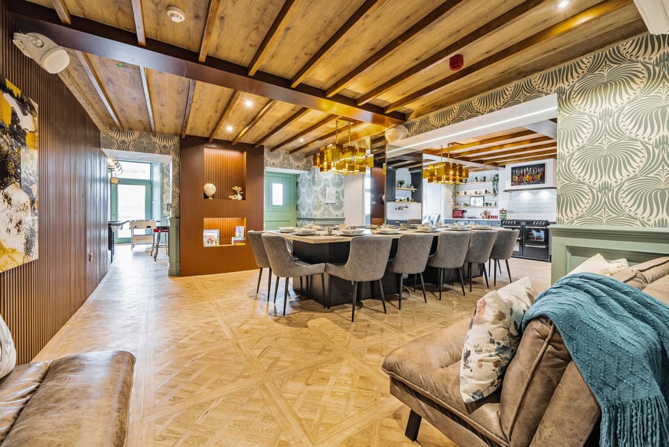 Opulent dining area for 14 with relaxation zone