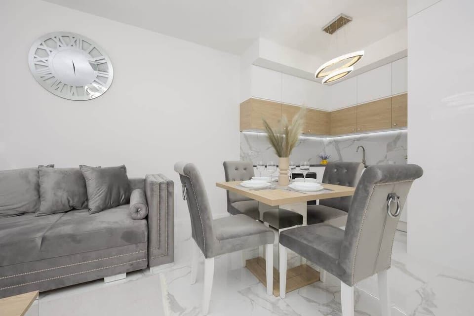 A different view of the dining and living area, highlighting the cohesive design and well-organized layout.

