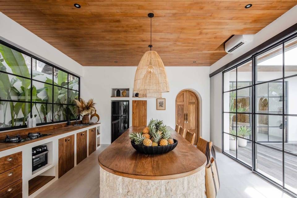 Fully equipped kitchen with dishes, cutlery, pots and pans, and more