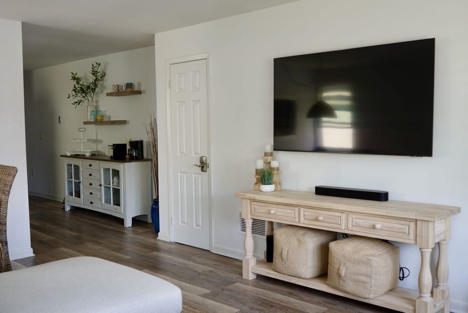 The smart TV and Sonos Beam offer streaming shows, movies, and music.