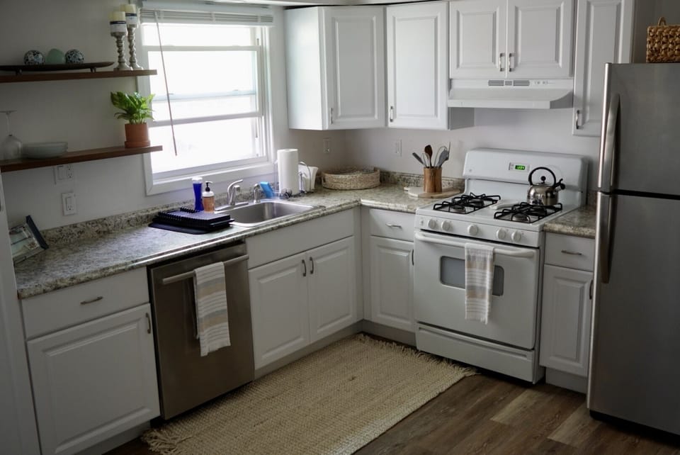 Modern kitchen fully stocked with all the appliances and accessories you need.