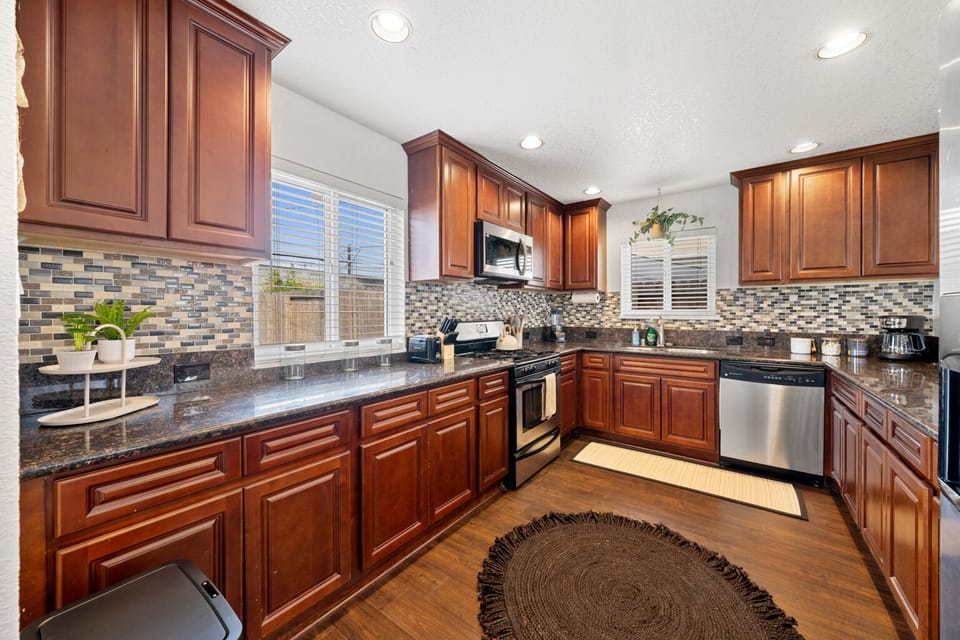 Make a masterful meal in this large kitchen; easy to navigate and serve.