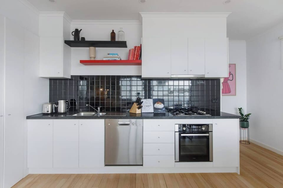The compact kitchen comes well equipped for your holiday catering, but you’ll also find plenty of eateries close by.
