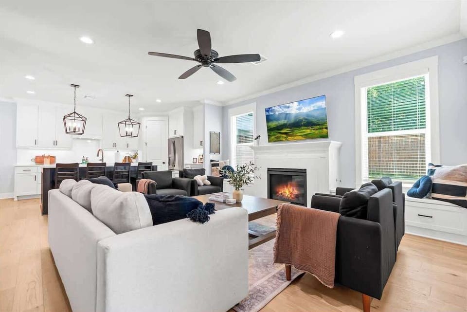 Open cozy concept with Living, Kitchen, and Dining all downstairs.