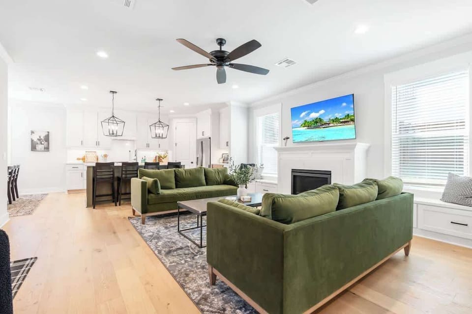 Our downstairs living and dining area is open concept. Burn a gas fire or watch your favorite streaming channels on our smart TV.