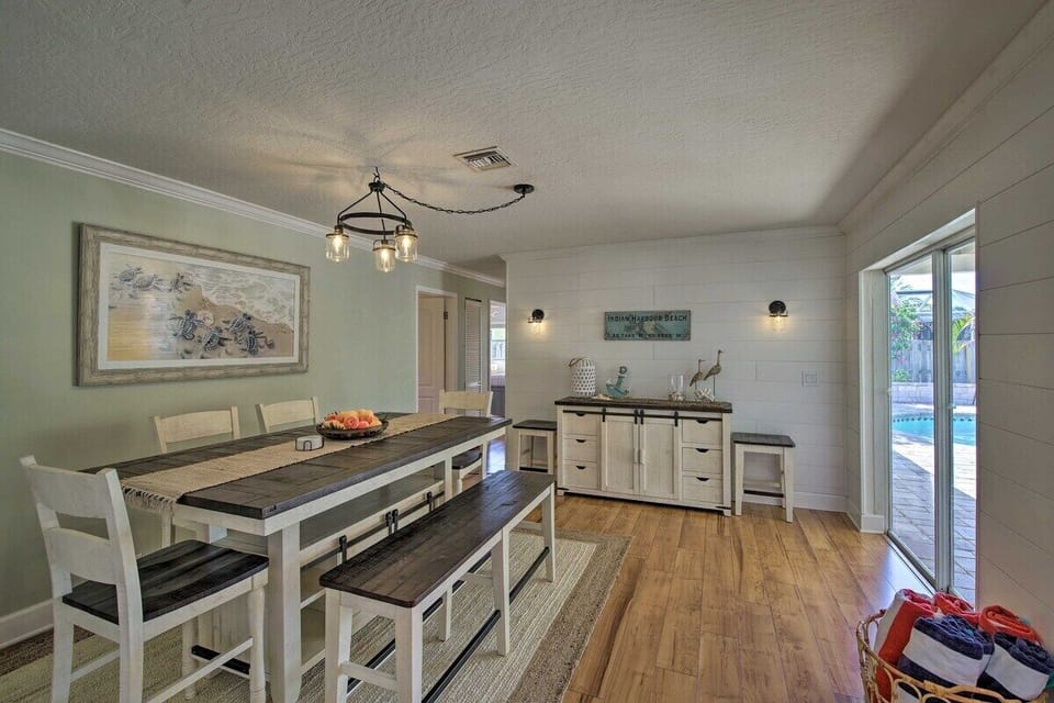 Large dining room table with seating for 9