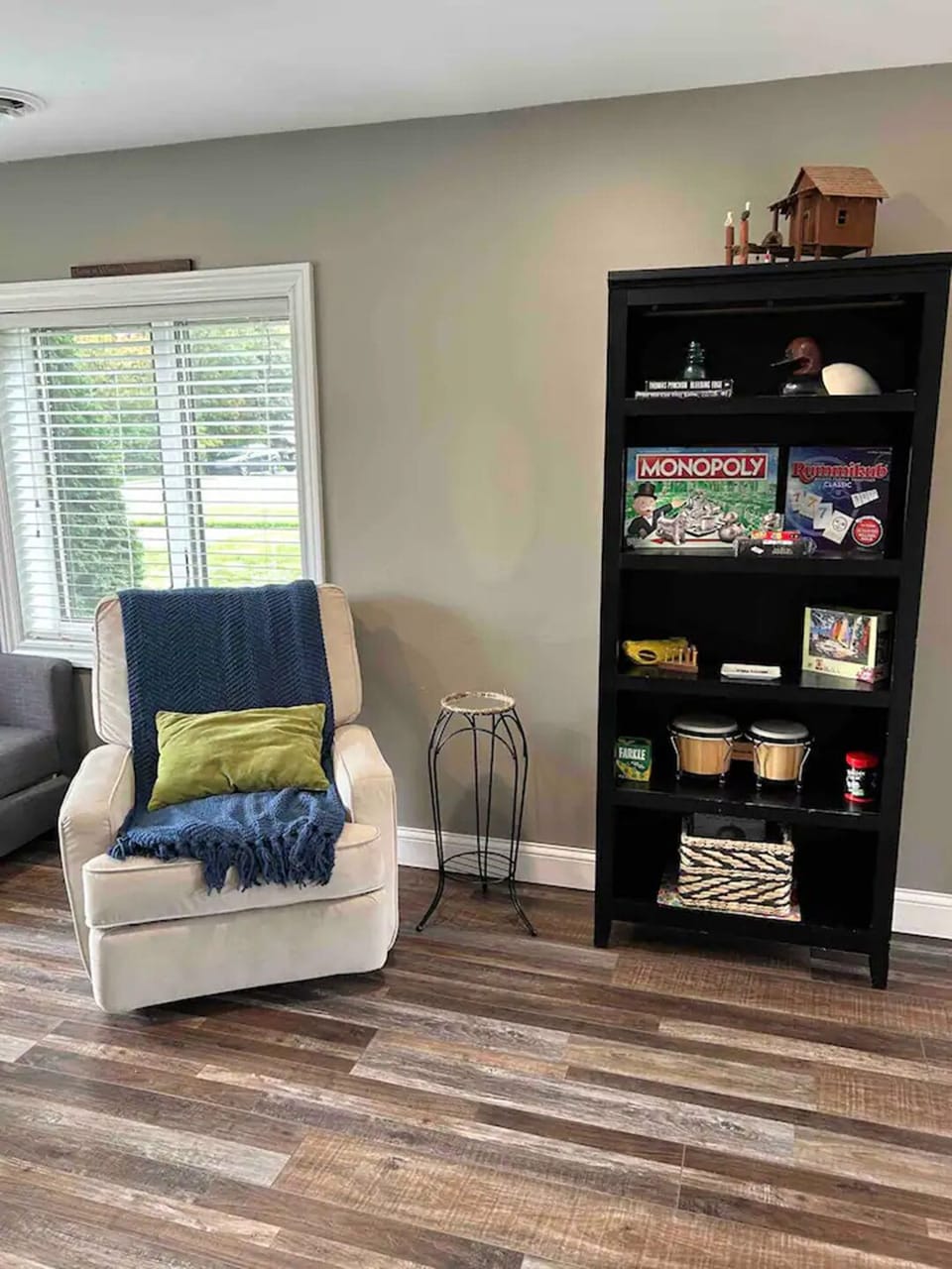 Swivel recliner in living area to curl up with a book of to binge watch TV.