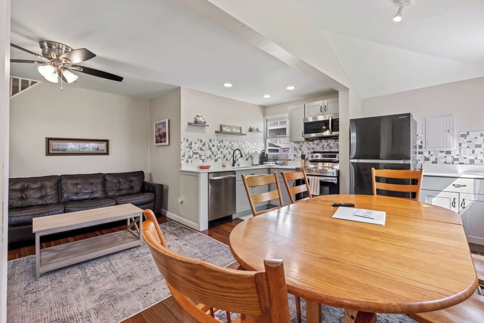 Large open living, dining and kitchen area.