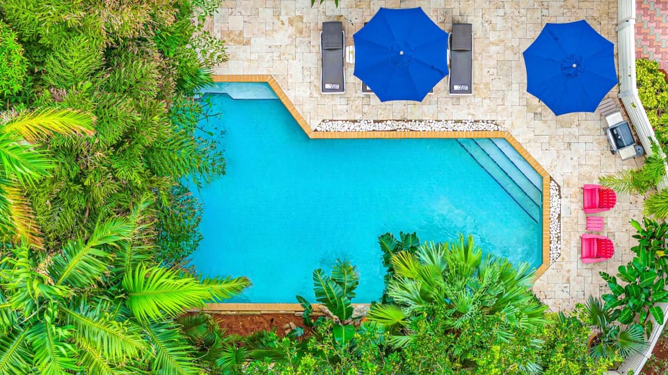 Come dive into the oversized heated pool at Escape Key.